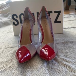 Schutz red patent pumps
